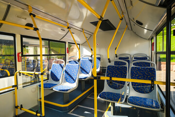 Empty City Bus Interior with Blue Seats © SGr