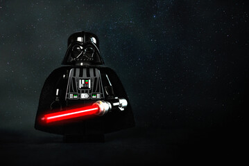 Naklejka premium Lego Star Wars Darth Vader and space for text. Illustrative editorial