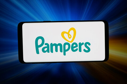 Stuttgart, Germany - 04-16-2026: In this photo illustration, the logo of US diaper brand Pampers (Procter and Gamble) is displayed on a smartphone in front of abstract background on computer screen.