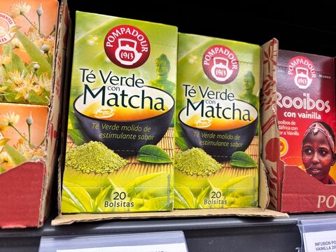 Alicante, Spain - April 25, 2026: Pompadour green tea with matcha packaging displayed on a supermarket shelf, featuring vibrant colors and product details clearly visible