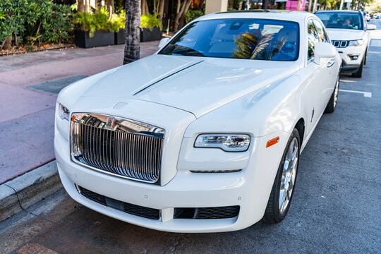 Miami, Florida, USA - July 27, 2025: Rolls Royce Ghost Series II 2015 ultra luxury sedan car. Luxury SUV car Rolls Royce Ghost Series II. Car Ghost Series II parked outdoor. White car, corner view