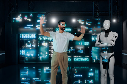 Developer man interacting with holographic code screens in 3D lab