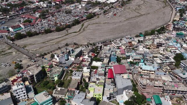 Drone view of houses with dry water resource in rishikesh chauda bigha