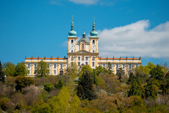 Ancient Church Vista. Serene Countryside Outlook With Grand Cathedral And Lush Green Surroundings