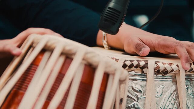 Traditional tabla drums played by a musician during the Holi festival