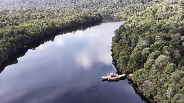 Fatman barge cable crossing of Pieman river on West coast of Tasmania &ndash; aerial view.