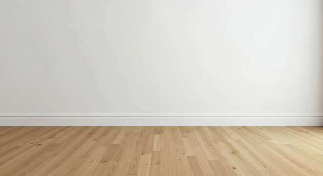 Clean empty interior room space featuring a bright white wall and light natural wood laminate flooring with a traditional white baseboard trim detail.