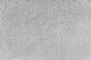 Fototapeta premium Close up, macro of white fabric texture with soft velvet, fluffy woven surface, rich textile detail. Knitted jersey cloth background, backdrop, wallpaper for design, fashion or interior projects