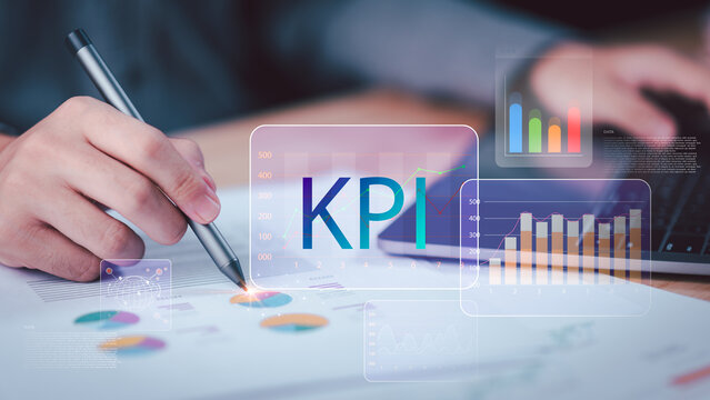 Data analyst measures KPI performance with business analytics, financial metrics, growth tracking, data visualization, performance reporting, strategic planning, revenue analysis, making insights.
