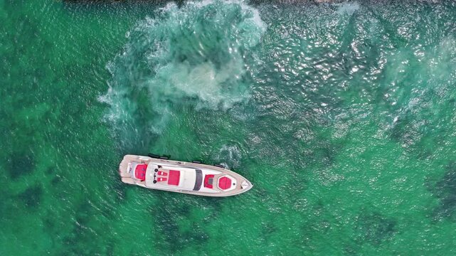Motor yacht luxury vessel. Boat motor yacht aerial. Motorboat tourism. Luxury boat yachting. Motorboat at sea. Vacation on summer. Luxury charter yacht in sea. Splashing motorboat
