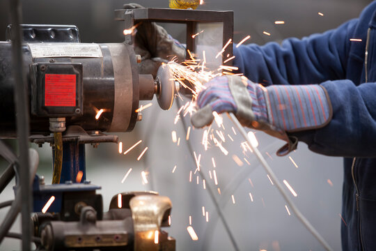 labor working grinding metal wire