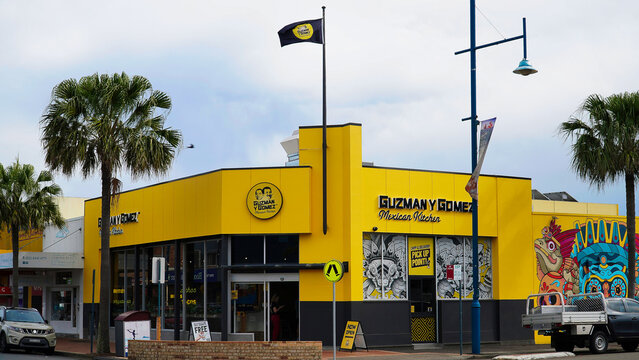 Umina beach NSW Australia.Guzman y Gomez restaurant offers Mexican food in a busy urban setting during overcast weather