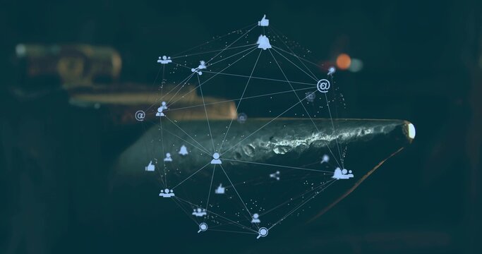 Floating hologram network glowing above metal rod on bench, displaying user and search icons