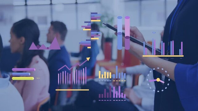 Presenter tapping tablet and animating business charts, bars rising and rearranging showing growth