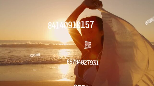 Model lifting shawl on shore starting moving data over her draping showing bikini walking fashion