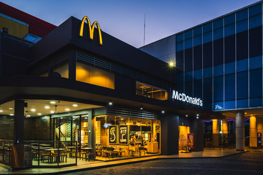 Modern McDonald's Restaurant Exterior at Dusk in Balikpapan