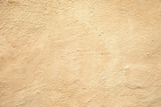 pattern of yellow  structured rough  plastered wall
