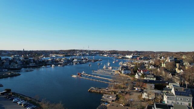 Amazing drone fly over Smith Cove coastal harbor and residential shoreline area, Gloucester, Massachusetts, US