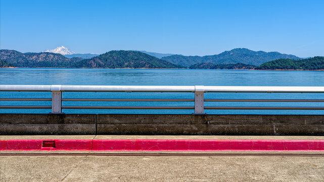 Panorama of Mount Shasta across Shasta Lake from the road over the dam in California, USA