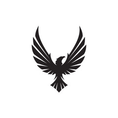 Obraz premium Black silhouette of a soaring eagle with wings spread