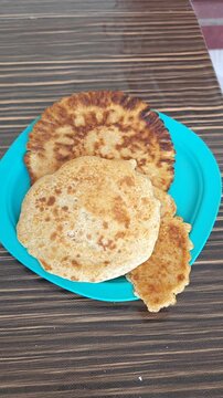 Serving Homemade Wheat Bread on Plate