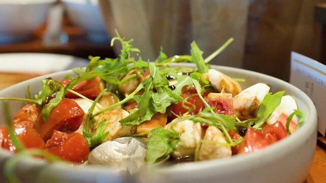 Fresh Caprese Salad with Mozzarella and Cherry Tomatoes in Buffet Bowl