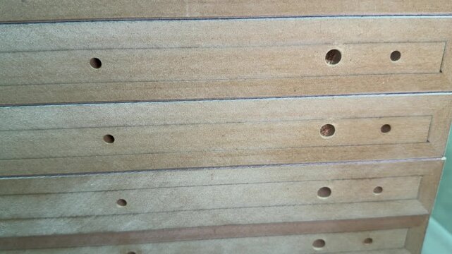 drilled mdf parts for subsequent assembly