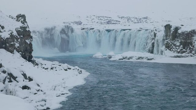 Go&eth;afoss Waterfall, a spectacular waterfall plunging over a curved in Fossholl, the north of Iceland