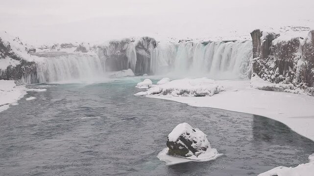 Go&eth;afoss Waterfall, a spectacular waterfall plunging over a curved in Fossholl, the north of Iceland