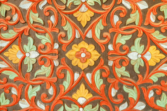 Ornamental floral pattern with intricate vintage design in warm tones, decorative background inspired by traditional art, ideal for textile, wallpaper, and cultural concepts