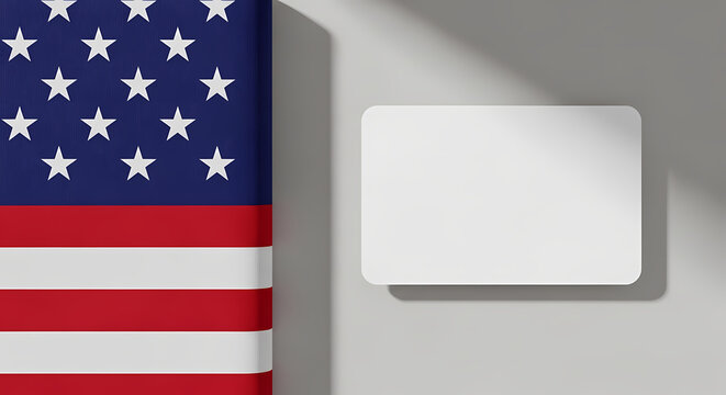 A close-up view of the American flag next to a blank white card on a gray background National Flag Week