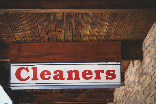 Dry cleaners sign on building