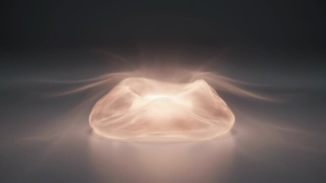 Soft, translucent, amorphous form glowing warmly from within
