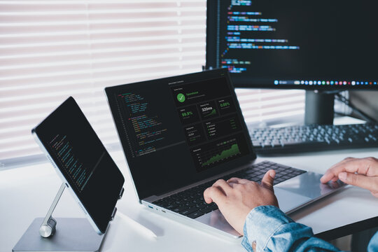 AI system success dashboard on laptop showing operational status uptime, stable performance metrics, developer monitoring deployed machine learning system, real time analytics and running services