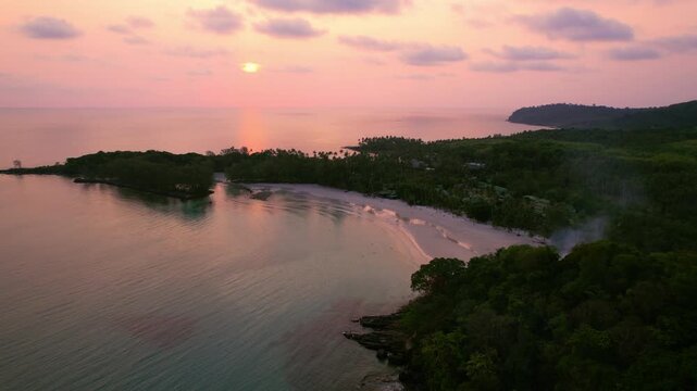 Khlong Hin Beach At Sunset, With Golden Sun Reflecting On Water - Koh Kood, Thailand. wide aerial shot