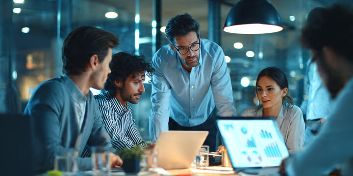 Busy modern office environment with diverse business people multitasking, collaborating, team members using laptops, smartphones and documents, networking and communication.