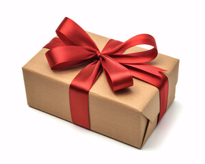 Obraz premium A beautifully wrapped gift box with a red ribbon on a white background for a special occasion or celebration