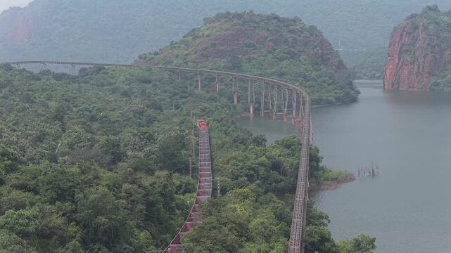 Aerial View of Train on Curved Railway Bridge in JSW Sandur Karnataka India