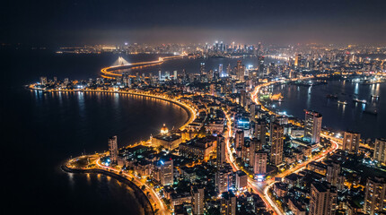 Aerial view of city scape at night in Mumbai, India  © pinan