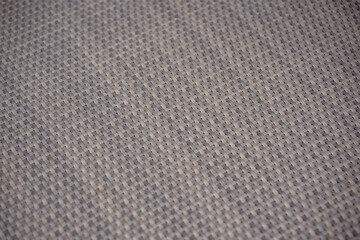 Fototapeta premium Grey woven rattan wicker texture background. Close up of synthetic polyrattan furniture surface pattern for abstract design.