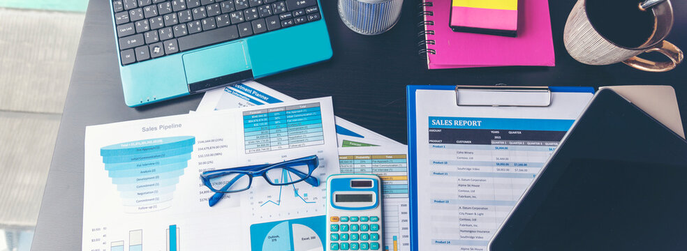 Banner Business Graphs charts office desk with copy space. Surfing internet online technology lifestyle. Banner Financial Planning Account Database Report. Technology lifestyle. Finance Excel graph
