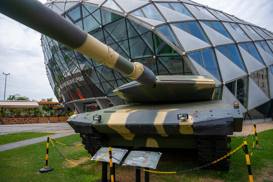 Modern Leopard 2A4 Main Battle Tank Displayed Outdoors in Front of Contemporary Glass Architecture at Balna Budapest Cultural Center in Hungary