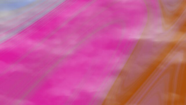 Blurry pink and orange abstract pattern ideal for backgrounds, digital art, website design, social media graphics, and print materials.