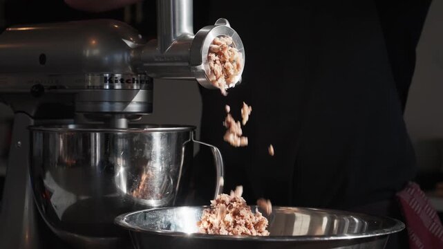Mushrooms are minced in preparation for a Beef Wellington dish (slow motion 4K).