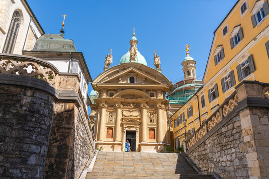 Mausoleum of Emperor Ferdinand II in Graz Austria with monumental baroque facade and grand staircase under bright blue sky