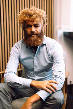 Businessman sitting on chair at office