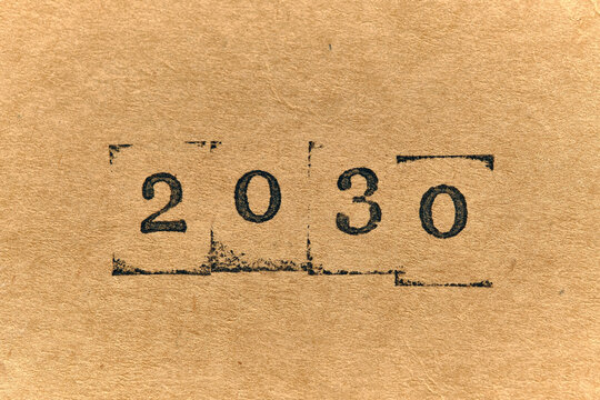 Year 2030 stamped on paper, symbolizing start new decade and global sustainability goals.