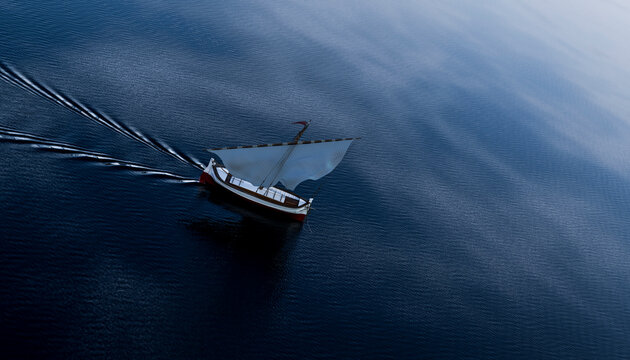 Aerial view of a sailboat navigating the deep blue sea
