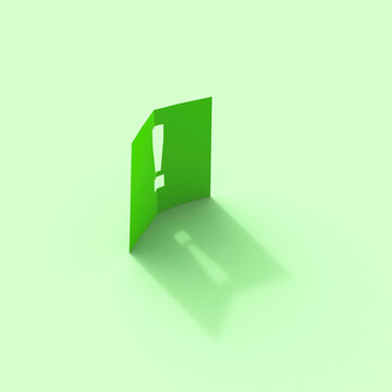Green folded paper with cutout exclamation mark and shadow