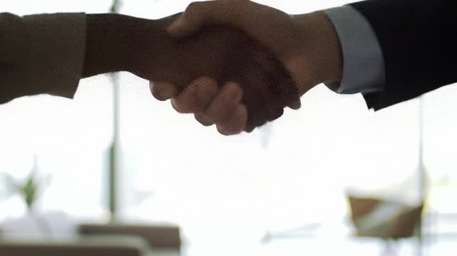 Smooth video of diverse hands in business-casual attire connecting, symbolizing partnership, support. Blurred abstract background with optimistic light. Concept of collaboration and shared success